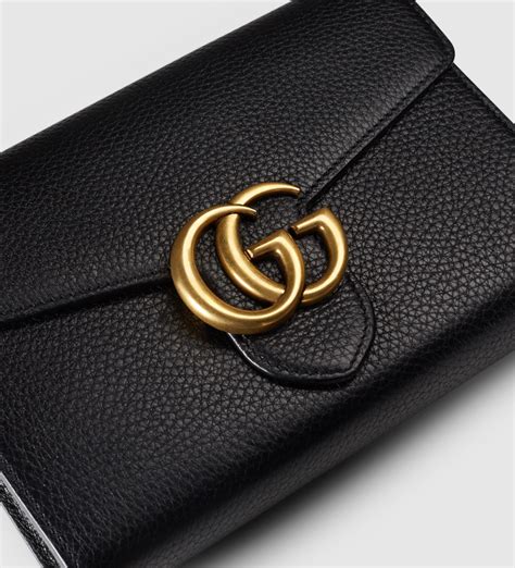 black gucci purse with gold chain|Gucci small wallet on chain.